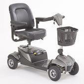 Red mobility scooter with padded seat, armrests, handlebars, and front basket on a white background, front view.