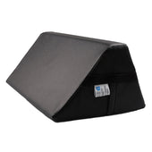Black wedge-shaped bed positioning aid with side pocket and label, on white background, angled front view.