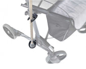 Topro Crutch Holder attached to a stroller frame holding a walking cane, close-up view.