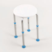 Round white shower stool with adjustable aluminium legs and blue anti-slip feet, shown on a white background, front view.