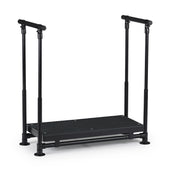 Black step with height-adjustable handrails and slip-resistant surface, designed for support during movement, side view.