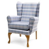 Blue high-back fireside chair with wooden legs and blue plaid fabric, stain-resistant upholstery, front angle view.