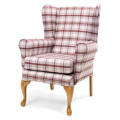 Red and white checked Balmoral fireside chair with stain-resistant seat and light wooden legs, front angle view.