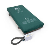 Dynamic mattress system with electric pump for pressure management on a white background, angled view.