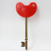 Radar National Key Scheme key with easy-turn handle for accessible toilets, close-up view.