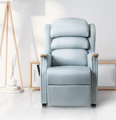 Henley dual motor recliner chair in Reef fabric with wooden arms and side pocket, placed in a modern living room, front angle.