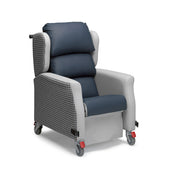 Blue manual porter chair with push handle, wheels, and a waterfall back for mobility, side view.