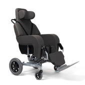 Black wheelchair with postural support, footrest, headrest and large rear wheels, side view.