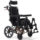 Clearline Astro Inovys Evo tilt-in-space wheelchair with headrest, padded arms, footrests and pressure relief features, side view.