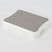 Grey and white NRS Nuvo adjustable stackable bath step with rounded corners on a white surface, front angle.
