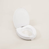 Able2 Atlantis raised toilet seat with lid, lid open, viewed from above on a light background.