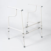 Toilet frame with open back, armrests, and four adjustable legs, metal and plastic materials, front angle view.