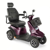 Plum Motion Healthcare Xquisite mobility scooter with four wheels, black seat with armrests and headrest, front basket, side view.
