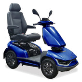 Blue four-wheeled mobility scooter with padded seat, armrests and mirrors on a white background, side view.