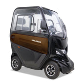 Bronze Motion Healthcare Xplorer mobility scooter with enclosed cabin and visible XPLORER logo, side view.