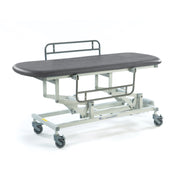 Sterling Electric Changing Table in dark grey with metal frame, side rail, black cushion and four castor wheels, side view.