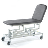 SEERS Medical Sterling Electric 2 Section Couch with height adjustment and wheels, side view.
