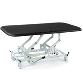 Black SEERS Medical hydraulic therapy mat table with height adjustment, white metal wheeled base, white background, front angle.