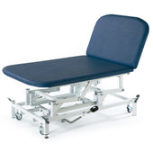 SEERS Medical Hydraulic Therapy Bobath Couch with adjustable backrest and white wheeled frame, side view.