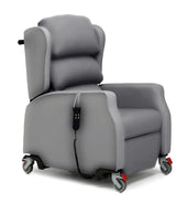 Repose Seating Madison tilt-in-space healthcare chair with cushioned pads, armrests, wheels and corded remote control, side view.