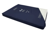 Reflect 2 Bariatric Mattress by Harvest Healthcare unzipped to display inner white foam, side view.
