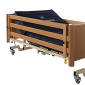 Bradshaw Bariatric Height Extension pair fitted to a bed frame for side rail height, side view.