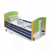 Sidhil Bradshaw Junior paediatric profiling bed with adjustable slatted base and side rails, three-quarter view.