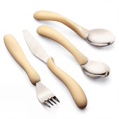 Homecraft Caring Cutlery set including fork, serrated knife and two spoons with thick handles for weak grip, studio view.