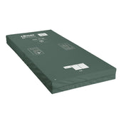 CasaFlex Mattress CMHR foam pressure redistribution mattress with printed safety and orientation instructions, high-angle view.