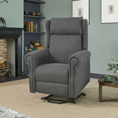 Opera Beds Delby Dual Motor Riser Recliner Chair in a living room with bookshelves, artwork and fireplace, front view.