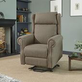 Opera Beds Delby Dual Motor Riser Recliner Chair in a living room with shelves, artwork and fireplace, front view.