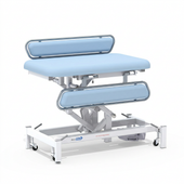 Medi-Plinth electric changing table with MRSA-resistant upholstery, side rails and wheels, front view.