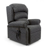 Repose Seating ErgoRise dual motor tilt-in-space chair with cushioned backrest, armrests, lumbar support and remote, front view.