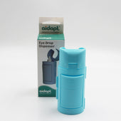 Aidapt Eye Drop Dispenser shown in front of branded box, used for helping apply eye drops accurately, front view.