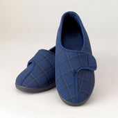 Two Homecraft Gents Washable Slippers, one upright and one sideways, both with black soles on a plain light background, side angle.