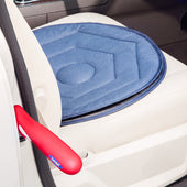 Stander Handy Bar and swivel cushion set positioned on a car seat and door frame, in use.