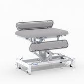 Hydraulic changing table, MRSA-resistant, padded surface, side rails, metal frame on wheels, NHS-approved, front view.