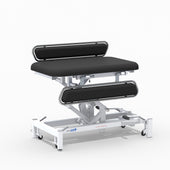 Medi-Plinth hydraulic changing table with MRSA-resistant padded surface and mobile metal frame, side view.