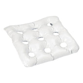 Square Homecraft inflatable bath cushion with circular drainage holes, angled view.