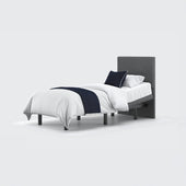 Opera Beds Jade Motion Adjustable Bed with headboard, white bedding, dark blue throw and pillow, front view.