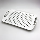 Able2 Stayput Anti-Slip Tray with handles and spaced holes on a textured surface, front view.