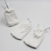 Set of three small drawstring pouches for storing replacement pads, shown grouped together, front view.