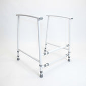 NRS Nuvo Adjustable Toilet Frame with metal frame and grey tips, height adjustable for bathroom support, front view.