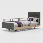 Opera Beds Signature Comfort Plus Profiling Bed with adjustable headboard, side rails and wheels, front view.