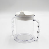 Homecraft transparent mug with two handles and spout lid on plain white background, front view.
