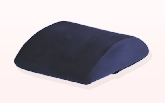 A smooth, curved black cushion or support pad with a minimalistic design, shown against a soft, gradient pink background.
