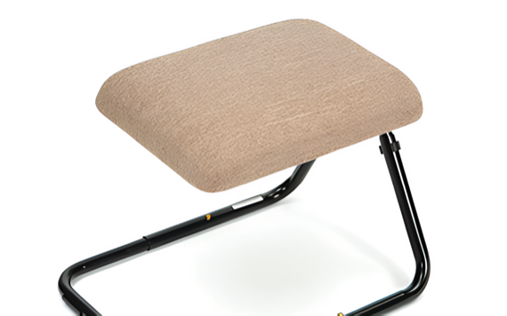 A beige footstool with a soft top and black metal frame, featuring an arched design for a modern look.