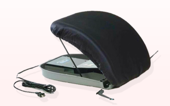 A black TV screen magnifier with a stand on a base. A power cord is on the left, and a separate part of the stand is to the right.