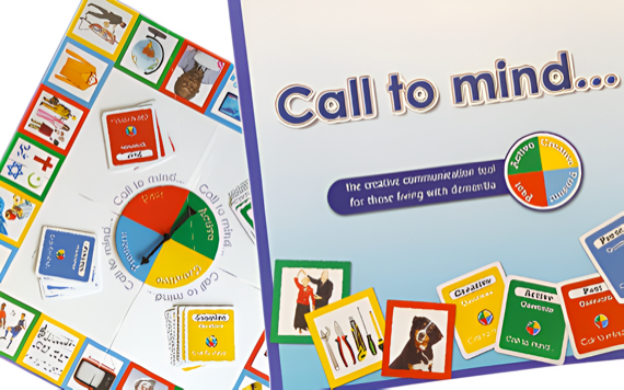 A board game for dementia care with colorful cards, a spinner, and images, promoting communication.