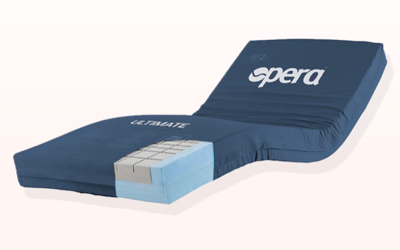 A blue adjustable mattress with a cutaway showing inner layers for support, set against a light background.